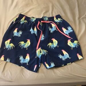 Chubbies XL rainbow rooster swim trunks. No lining.